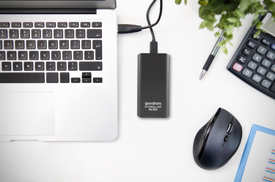 External backup disk hard drive connected to laptop